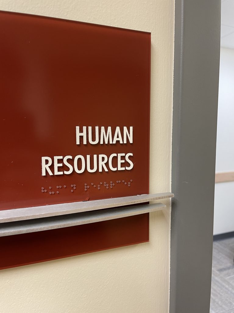 Human Resources placard beside office door